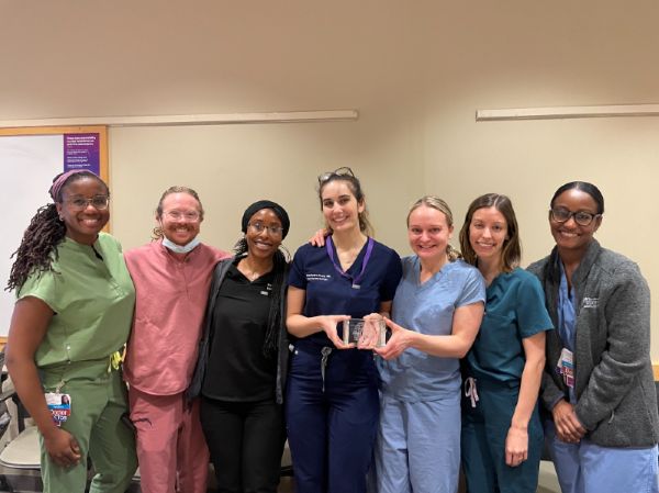 Residents posing with award