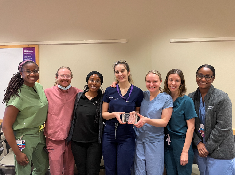 Residents posing with award